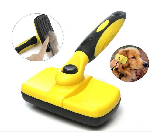 Self-cleaning slicker brush with a pad of loose dog fur lifted off
