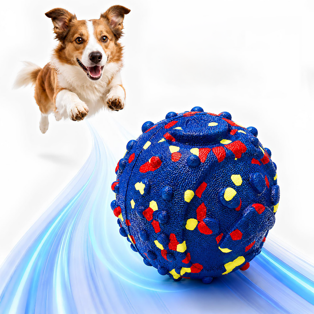 Dog leaping after the blue self-moving Vendora rolling ball